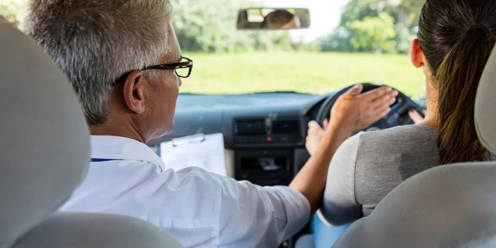 Driving instructor guiding a learner driver during an EDT lesson in Dundalk